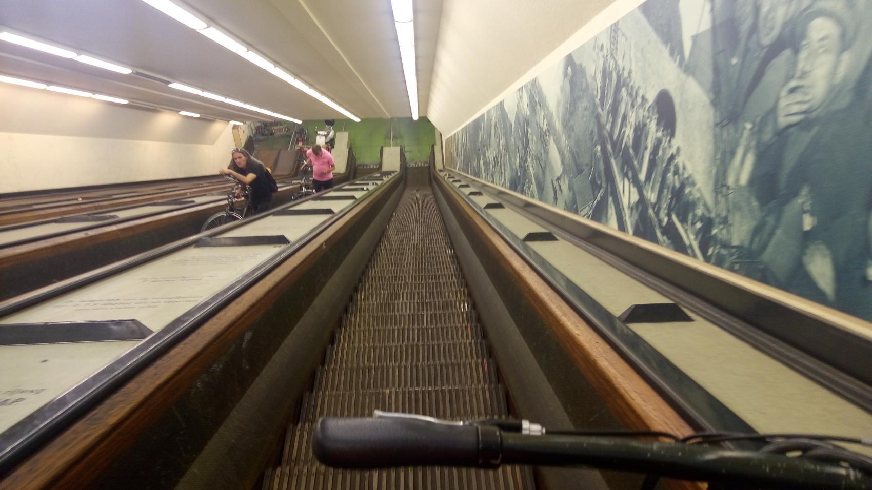 Most of cyclists use escalators to get to and from the tunnel level.